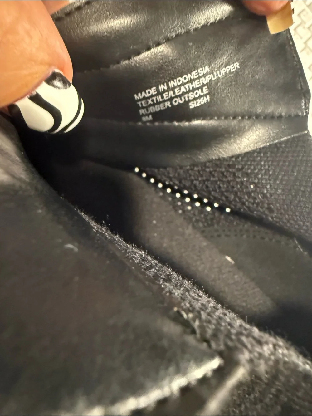 Michael Kors Zuma Black and White Zip-Front Platform Sneakers with Stud Detail